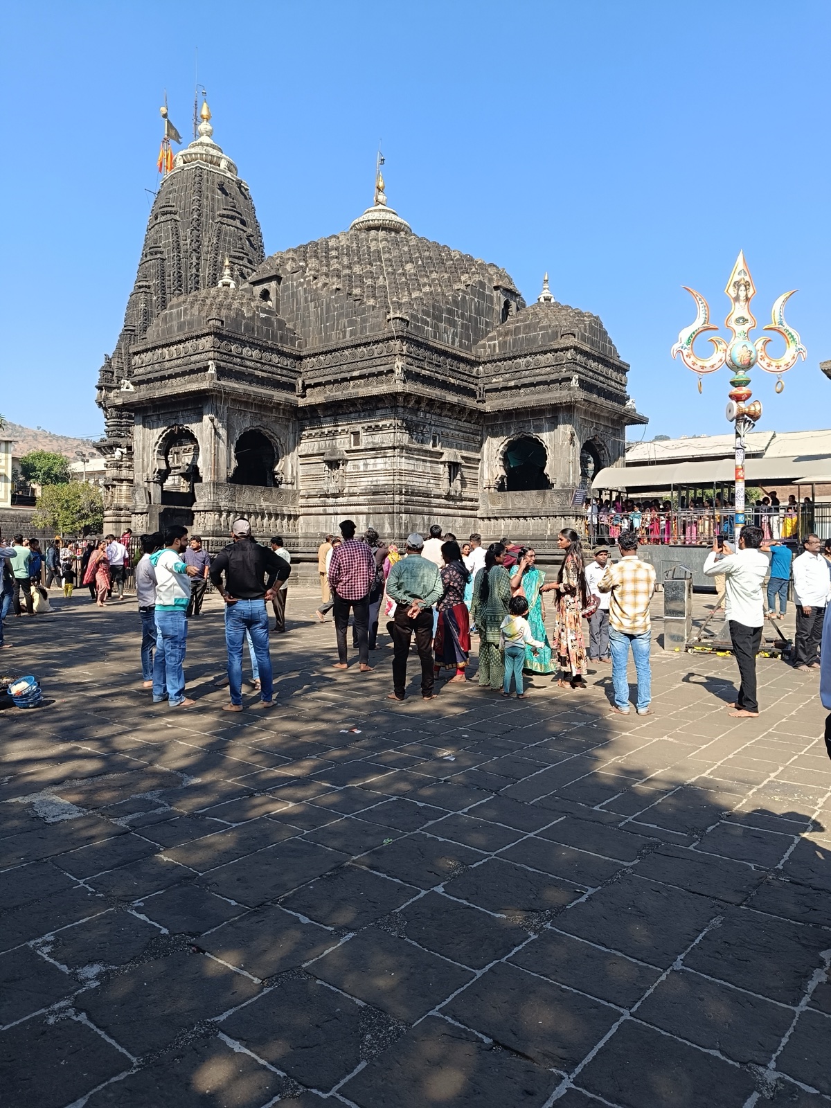 The black-basalt Trimbakeshwar temple beneath Brahmagiri hill near Nashik